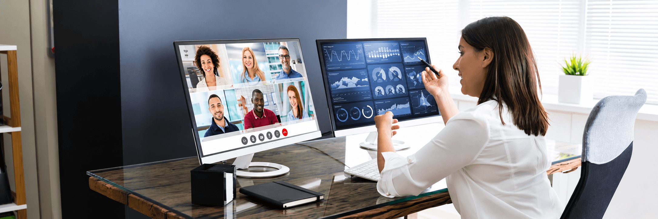 A professional connecting with colleagues by video while reviewing medical information